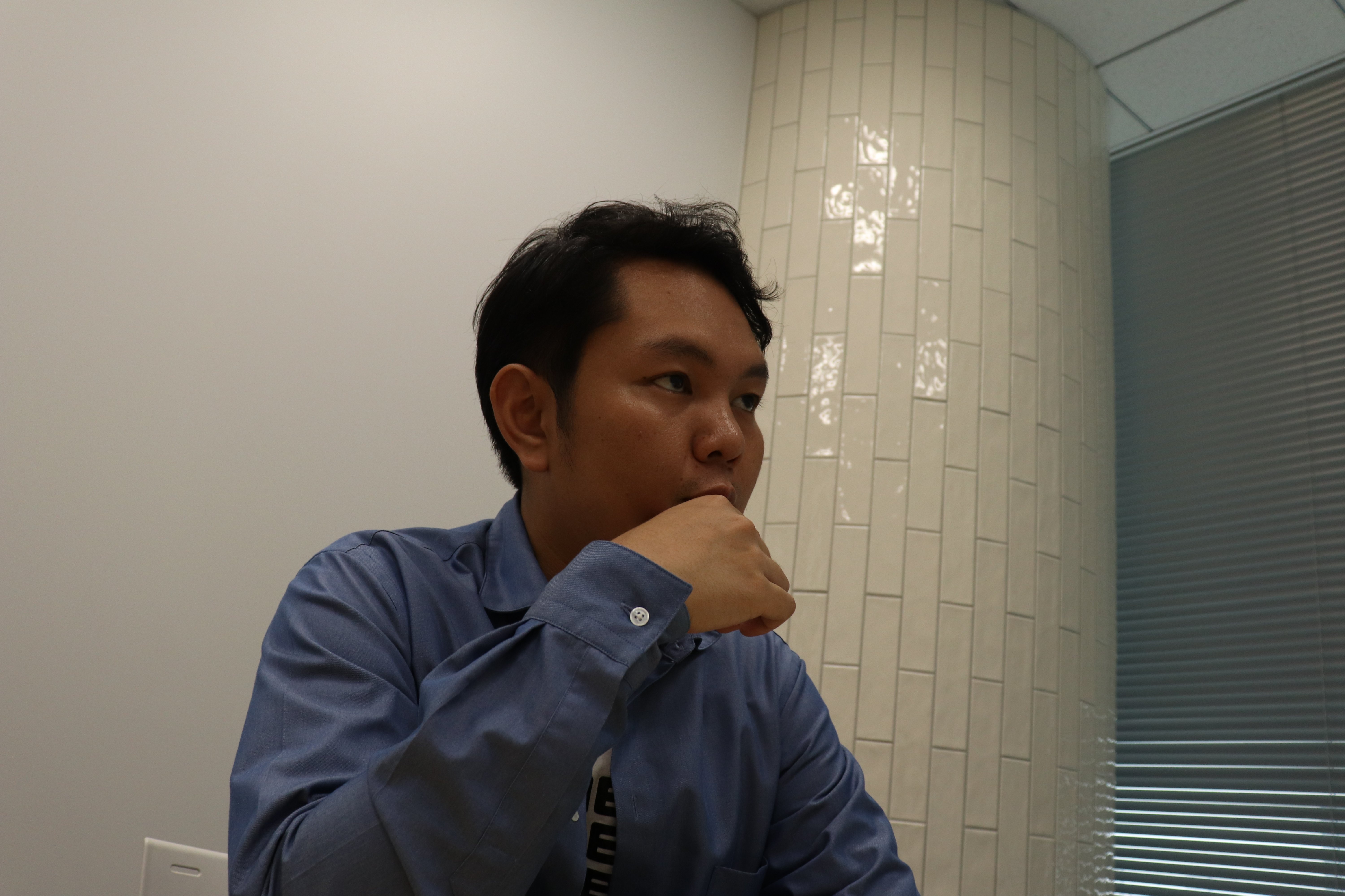 組織の拡大とともに起こった問題について語る合田氏